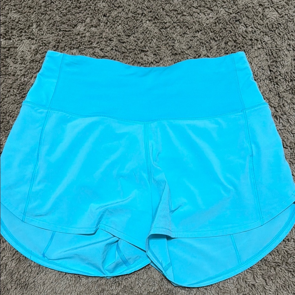 Lululemon blue high rise speed up shorts 4” inseam